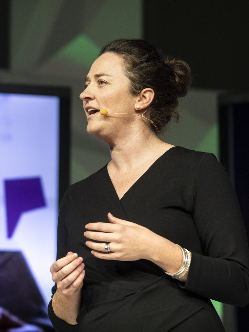 Jo Palmer speaking on stage